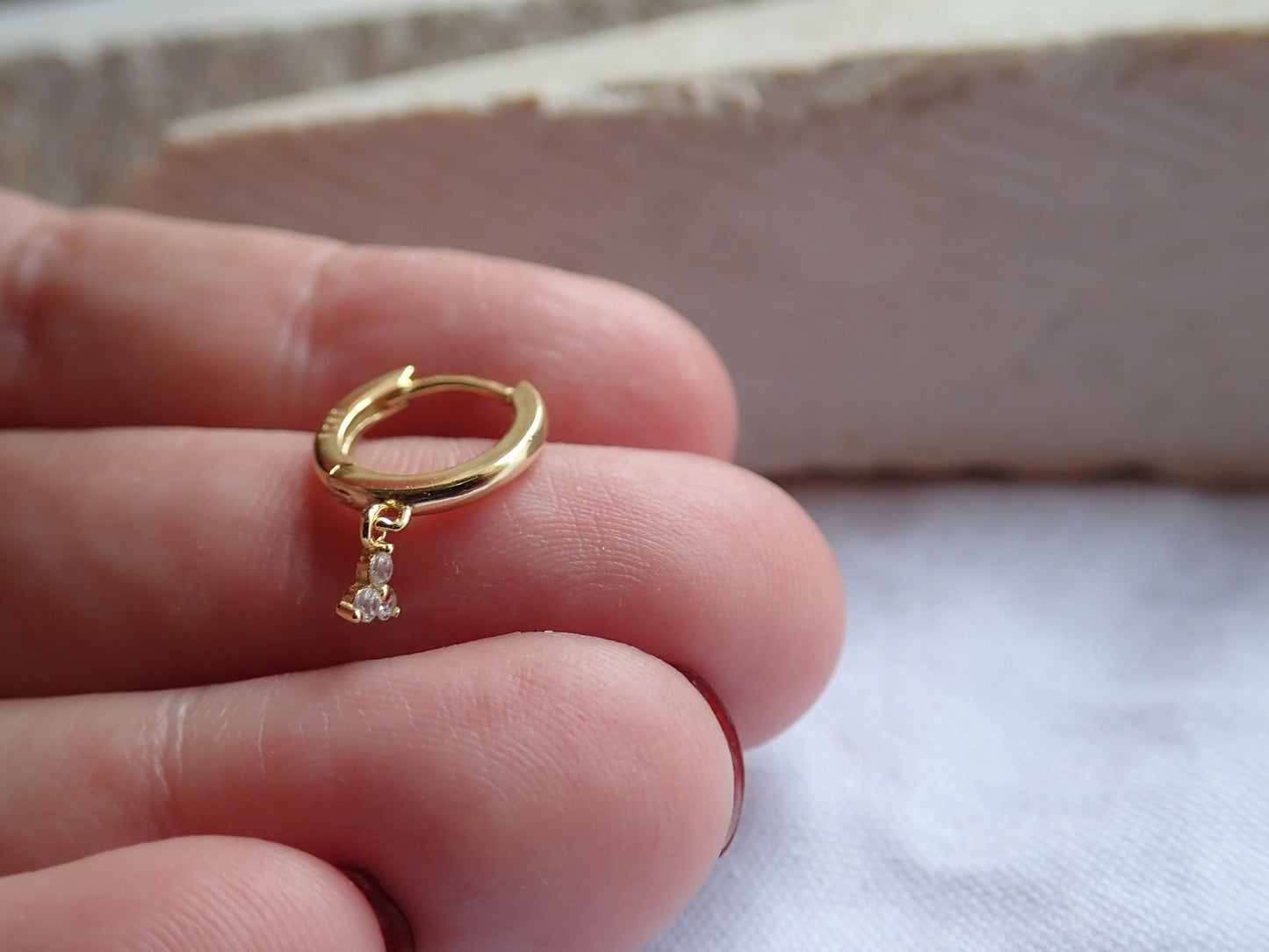 Tiny Huggie Hoop Earrings with Trefoil Crystal Charm – Gold or Sterling Silver