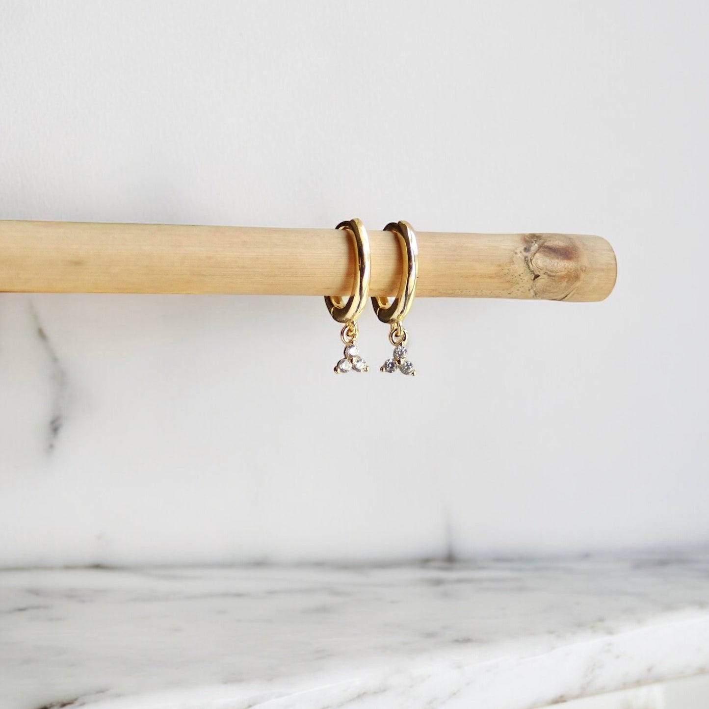 Tiny Huggie Hoop Earrings with Trefoil Crystal Charm – Gold or Sterling Silver