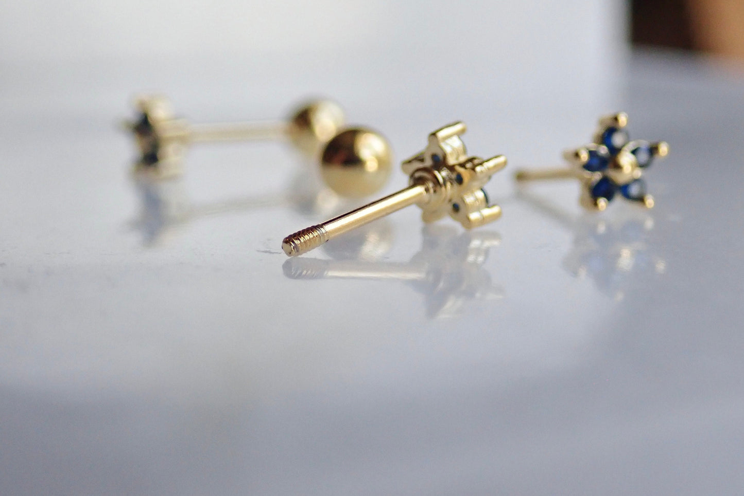 Blue CZ Flower Stud Earrings • Sterling Silver with 14K Gold Plating • Small Screw Back Earrings • Dainty Floral Studs for Second Hole