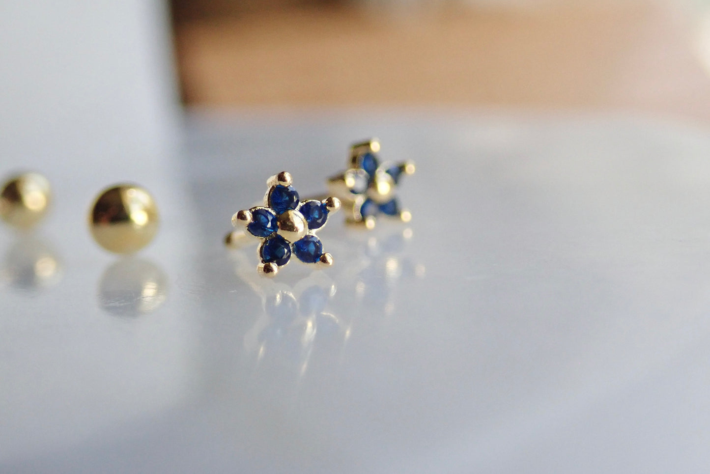 Blue CZ Flower Stud Earrings • Sterling Silver with 14K Gold Plating • Small Screw Back Earrings • Dainty Floral Studs for Second Hole